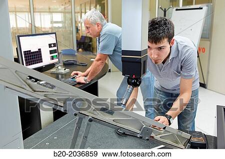 Stock Photo - The SAT team calibrating three-dimensional machine. Calibration of CMM. Coordinate Measuring Machine. Innovative Metrology applied. Sariki Metrology. Elgoibar. Gipuzkoa. Basque Country. Spain.. Fotosearch