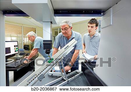 Stock Photo - The SAT team calibrating three-dimensional machine. Calibration of CMM. Coordinate Measuring Machine. Innovative Metrology applied. Sariki Metrology. Elgoibar. Gipuzkoa. Basque Country. Spain.. Fotosearch