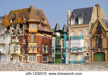 Stock Image - the sea front villas seen from the shingle beach, Mers-Les-Bains, Somme department, Picardie region, France, Europe. Fotosearch