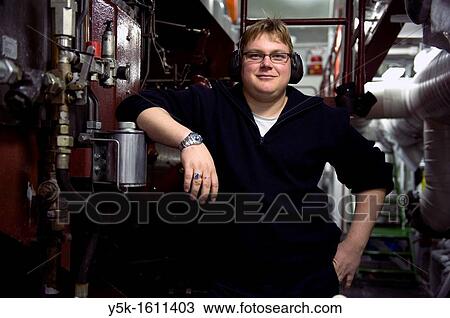 The second engineer of container-vessel MV Flintercape controls the engine-room of the vessel during absence of the first engineer. The ship is sailing from Rotterdam, Netherlands to Sundsvall, Sweden. View Large Photo Image Stock Image - The second engineer of container-vessel MV Flintercape controls the engine-room of the vessel during absence of the first engineer. The ship is sailing from Rotterdam, Netherlands to Sundsvall, Sweden.. Fotosearch