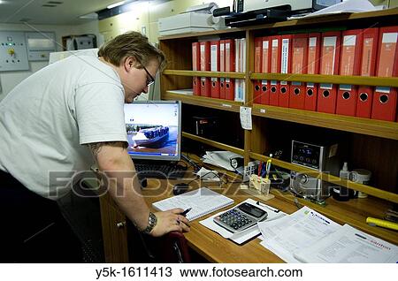 The second engineer of container-vessel MV Flintercape controls the engine-room of the vessel during absence of the first engineer. The ship is sailing from Rotterdam, Netherlands to Sundsvall, Sweden. View Large Photo Image Stock Image - The second engineer of container-vessel MV Flintercape controls the engine-room of the vessel during absence of the first engineer. The ship is sailing from Rotterdam, Netherlands to Sundsvall, Sweden.. Fotosearch