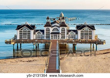 The Sellin Pier is a pier at the Baltic Sea. The pier is 394 meters long. It was inaugurated in 1998, Sellin, Ruegen Island, County Vorpommern-Ruegen, Mecklenburg-Western Pomerania, Germany, Europe. View Large Photo Image Picture - The Sellin Pier is a pier at the Baltic Sea. The pier is 394 meters long. It was inaugurated in 1998, Sellin, Ruegen Island, County Vorpommern-Ruegen, Mecklenburg-Western Pomerania, Germany, Europe.. Fotosearch