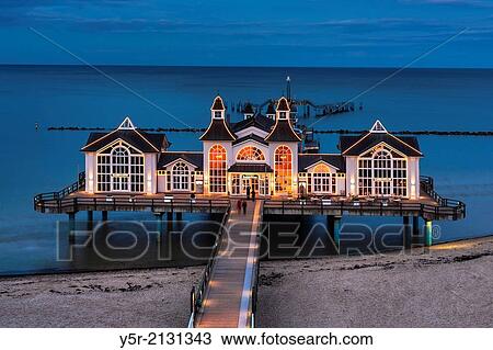 The Sellin Pier is a pier at the Baltic Sea. The pier is 394 meters long. It was inaugurated in 1998, Sellin, Ruegen Island, County Vorpommern-Ruegen, Mecklenburg-Western Pomerania, Germany, Europe. View Large Photo Image Stock Image - The Sellin Pier is a pier at the Baltic Sea. The pier is 394 meters long. It was inaugurated in 1998, Sellin, Ruegen Island, County Vorpommern-Ruegen, Mecklenburg-Western Pomerania, Germany, Europe.. Fotosearch