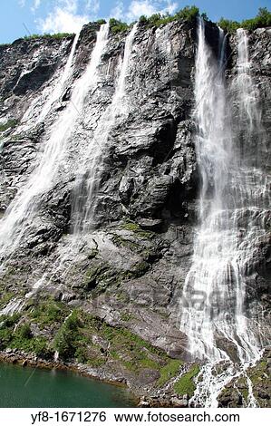 The seven sisters waterfall, Geiranger Fjord, Hellesylt Norway View Large Photo Image Stock Photograph - The seven sisters waterfall, Geiranger Fjord, Hellesylt Norway. Fotosearch