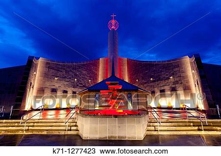 Stock Image - The shrine of the Holy Spirit illuminated at night in Branson, Missouri, USA. Fotosearch
