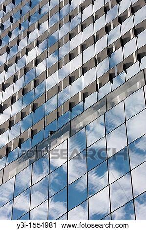 The sky and clouds reflected in the windows of building facades in New York City, USA View Large Photo Image Stock Image - The sky and clouds reflected in the windows of building facades in New York City, USA. Fotosearch