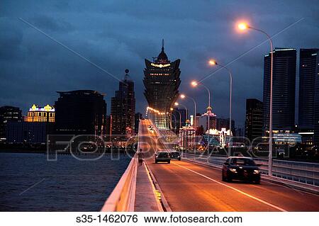 The skyline of central Macau from Macau-Taipan Bridge aka Porto Governador Nobre de Carvalho Bridge Macau China. View Large Photo Image Stock Photograph - The skyline of central Macau from Macau-Taipan Bridge aka Porto Governador Nobre de Carvalho Bridge Macau China.. Fotosearch