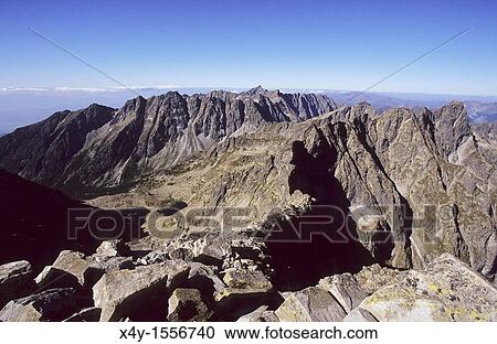 The skyline of High Tatras seen from the summit of Rysy, the peak on Slovak - Polish border View Large Photo Image Stock Image - The skyline of High Tatras seen from the summit of Rysy, the peak on Slovak - Polish border. Fotosearch