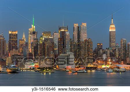 The skyline of Manhattan, New York City, USA at twilight as viewed over the Hudson River from New Jersey View Large Photo Image Stock Photograph - The skyline of Manhattan, New York City, USA at twilight as viewed over the Hudson River from New Jersey. Fotosearch
