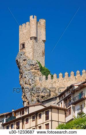 Stock Photo - The spectacular tower of Frias castle, above the houses Las Merindades, Burgos Spain. Fotosearch