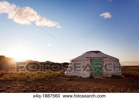 The sun rises in the Gobi desert View Large Photo Image Stock Image - The sun rises in the Gobi desert. Fotosearch