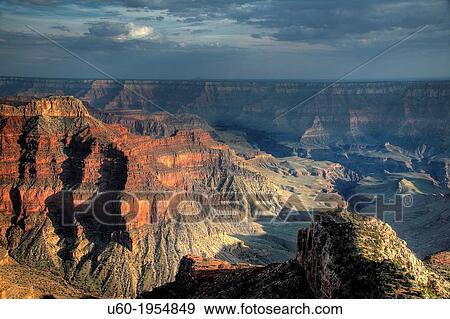Stock Photo - The sun sets in the Grand Canyon from Point Sublime, Grand Canyon National Park, Arizona.. Fotosearch