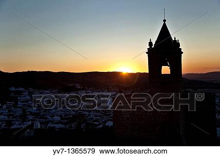 The sunset, with the Tower of Homage of the Alcazaba to the light, made from the White Tower of the Citadel of Antequera, Antequera, Andalusia, Spain View Large Photo Image Stock Photo - The sunset, with the Tower of Homage of the Alcazaba to the light, made from the White Tower of the Citadel of Antequera, Antequera, Andalusia, Spain. Fotosearch