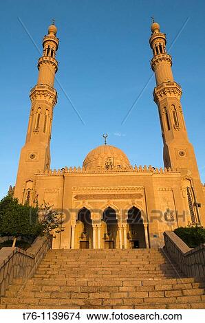 The Tabia Grand Mosque in Aswan Egypt lit up at sunset View Large Photo Image Picture - The Tabia Grand Mosque in Aswan Egypt lit up at sunset. Fotosearch