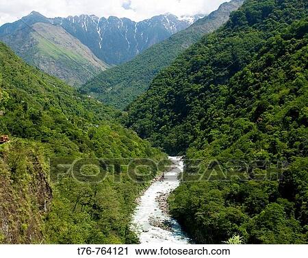 The Teesta River running through a verdant valley in the Himalayas of Sikkim India View Large Photo Image Stock Image - The Teesta River running through a verdant valley in the Himalayas of Sikkim India. Fotosearch