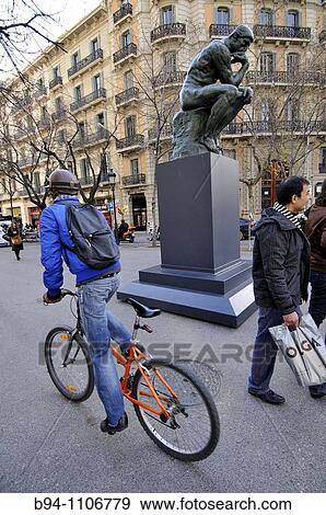 Stock Photo - The Thinker (1879-1889) sculpture by Auguste Rodin (1840-1917), temporary exhibition in Rambla de Catalunya, Barcelona, Catalonia, Spain. Fotosearch