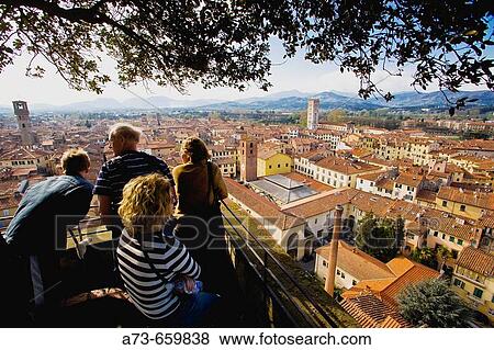 The town from the top of Torre (tower) Guinigi. Lucca. Tuscany, Italy View Large Photo Image Stock Photo - The town from the top of Torre (tower) Guinigi. Lucca. Tuscany, Italy. Fotosearch