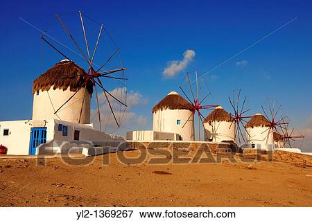 The traditional Greek windmills of Mykonos Chora Cyclades Islands, Greece View Large Photo Image Stock Photo - The traditional Greek windmills of Mykonos Chora Cyclades Islands, Greece. Fotosearch