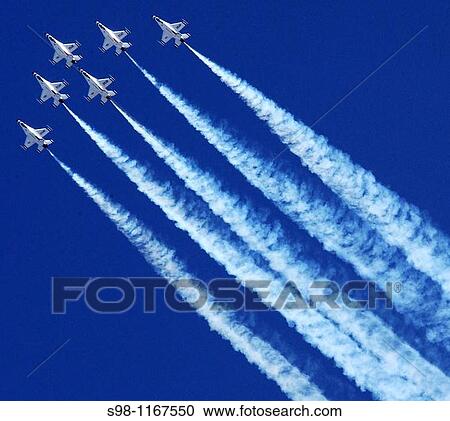 Stock Image - The United States Air Force Thunderbirds perform during the Aerospace and Arizona Days air show March 20, 2010, at Davis Monthan Air Force Base This air show kicked off the team's 57th season. Fotosearch