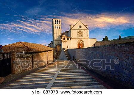 The upper facade of the Papal Basilica of St Francis of Assisi, Basilica Papale di San Francesco Assisi, Italy View Large Photo Image Stock Photo - The upper facade of the Papal Basilica of St Francis of Assisi, Basilica Papale di San Francesco Assisi, Italy. Fotosearch