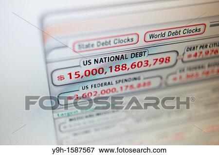 Stock Photo - The US national debt of over $15 trillion is shown on a clock on a website on Wednesday, November 16, 2011? Richard B Levine. Fotosearch