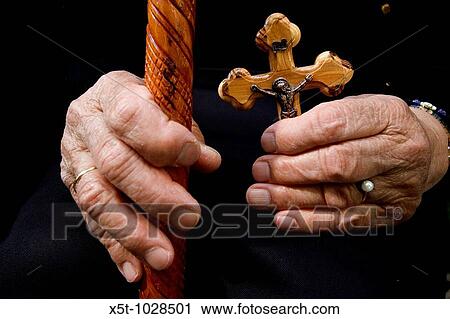 The Via Dolorosa Procession, Jerusalem, Israel, Good Friday Easter 2005 A close up of a hand holding a cross View Large Photo Image Stock Image - The Via Dolorosa Procession, Jerusalem, Israel, Good Friday Easter 2005 A close up of a hand holding a cross. Fotosearch