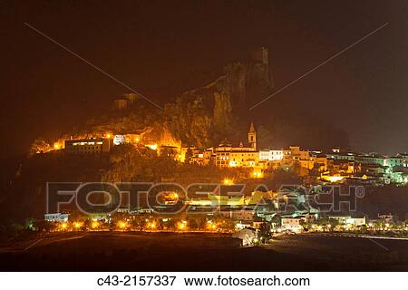 The White Town of Zahara de la Sierra below its Moorish castle at night. CBdiz province, Andalusia, Spain. View Large Photo Image Stock Photo - The White Town of Zahara de la Sierra below its Moorish castle at night. CBdiz province, Andalusia, Spain.. Fotosearch