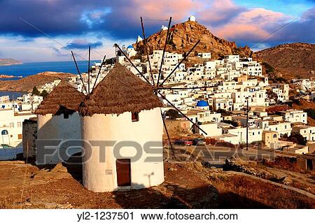 The Windmills overlooking Chora town Ios Cylcades Islands, Greece View Large Photo Image Stock Image - The Windmills overlooking Chora town Ios Cylcades Islands, Greece. Fotosearch