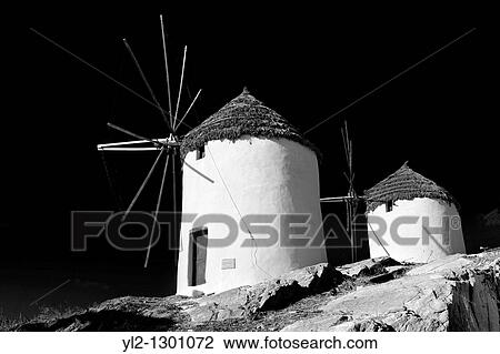 The Windmills overlooking Chora town Ios Cylcades Islands, Greece View Large Photo Image Stock Image - The Windmills overlooking Chora town Ios Cylcades Islands, Greece. Fotosearch