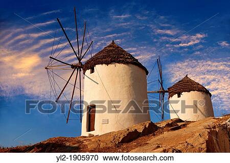 The Windmills overlooking Chora town Ios Cylcades Islands, Greece View Large Photo Image Stock Image - The Windmills overlooking Chora town Ios Cylcades Islands, Greece. Fotosearch