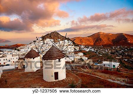 The Windmills overlooking Chora town Ios Cylcades Islands, Greece View Large Photo Image Stock Photography - The Windmills overlooking Chora town Ios Cylcades Islands, Greece. Fotosearch