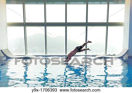 Stock Image - The world's highest swimming pool on the top floor of the Ritz Carlton at the International Commerce Centre in Hong Kong. Fotosearch
