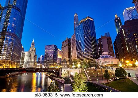 Stock Photography - The Wrigley Building and Chicago River walk at night, Chicago, Illinois, USA. Fotosearch