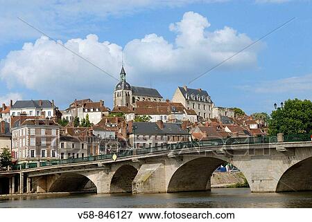 Stock Photo - The Yonne river at Joigny, Yonne, France. Fotosearch