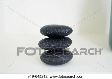 Stock Image - Therapy stones in spa. Maldives Island, Indian Ocean.. Fotosearch