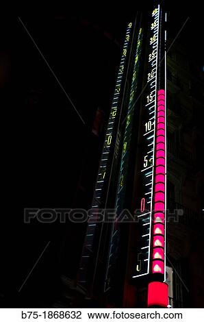 Stock Image - thermometer outside in the street marking temperature in degrees Celsius. Fotosearch