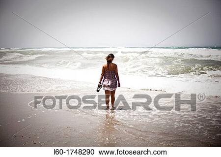 Thinking girl by the sea, Cabo de Gata, Almer? a, Spain View Large Photo Image Stock Image - Thinking girl by the sea, Cabo de Gata, Almer? a, Spain. Fotosearch