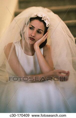Thoughtful bride waiting for groom View Large Photo Image Stock Photo - Thoughtful bride waiting for groom. Fotosearch