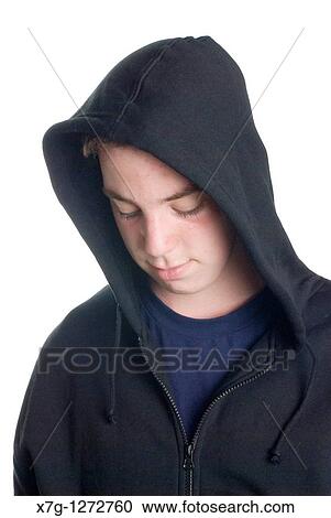 Thoughtful teenage boy in hoody View Large Photo Image Stock Image - Thoughtful teenage boy in hoody. Fotosearch
