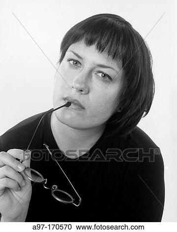 Stock Image - Thoughtful woman. Fotosearch