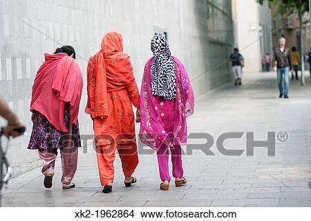 Three arabic woman walking on Raval, Barcelona View Large Photo Image Picture - Three arabic woman walking on Raval, Barcelona. Fotosearch