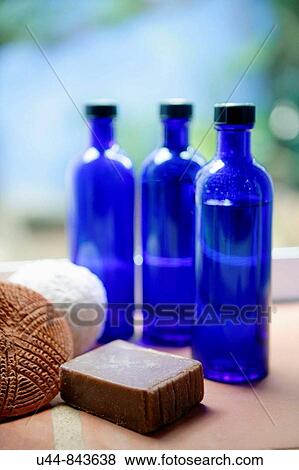 three blue glass bottles and soap in the bathroom View Large Photo Image Stock Photo - three blue glass bottles and soap in the bathroom. Fotosearch
