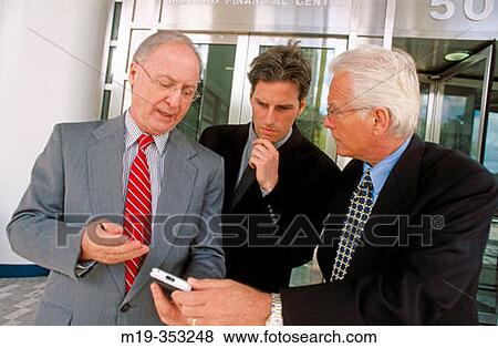 three businessman talking View Large Photo Image Stock Photo - three businessman talking. Fotosearch