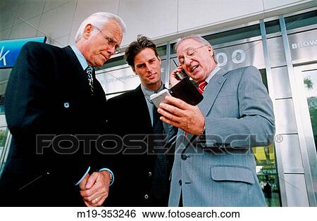 three businessman talking View Large Photo Image Stock Photograph - three businessman talking. Fotosearch