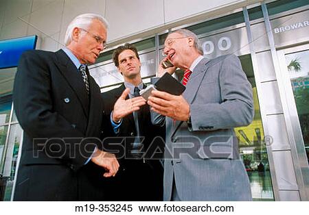 three businessman talking View Large Photo Image Stock Photography - three businessman talking. Fotosearch