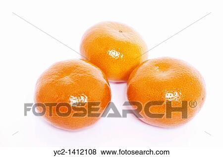 Stock Photo - Three clementines on a white background. Fotosearch