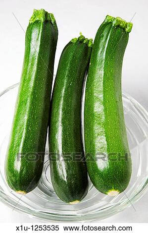 Three Courgettes in a Glass Bowl View Large Photo Image Stock Photography - Three Courgettes in a Glass Bowl. Fotosearch