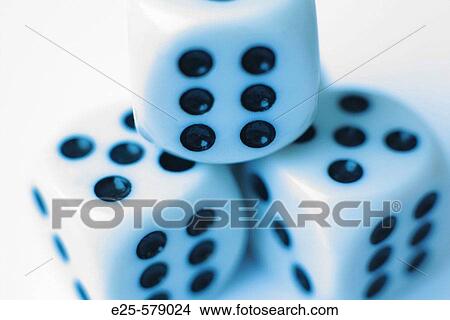 Picture - Three dice with numer six facing out. Fotosearch