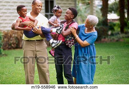 three generation standing outdoors View Large Photo Image Stock Photograph - three generation standing outdoors. Fotosearch
