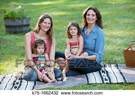 Three generations of females View Large Photo Image Stock Image - Three generations of females. Fotosearch